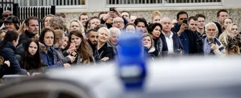 Getty Images People gather at the High security courthouse, in Schiphol, Amsterdam, on March 12, 2018 for the Holleeder trial