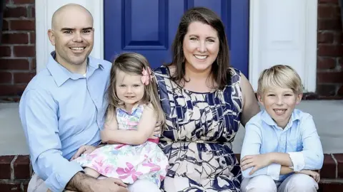 Kristin Dillensnyder  Kristin Dillensnyder with her husband and two children