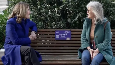 People having a conversation on a Chatty Bench