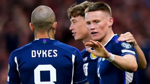 Scott McTominay celebrates scoring Scotland's second goal