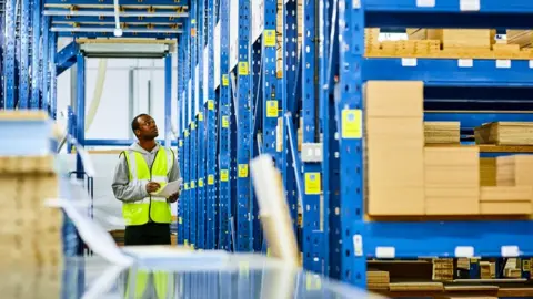 Getty Images Black worker in a warehouse