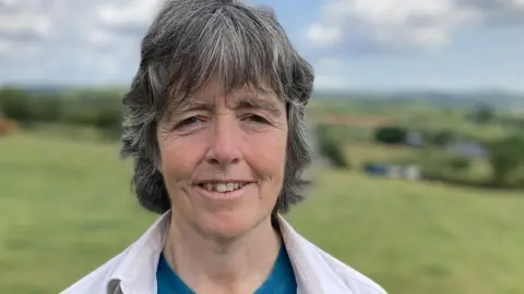 BBC Charlotte Llywelyn in a field