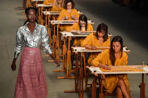 Nelson Almeida / AFP A model presents a creation by Patricia Viera during the Sao Paulo Fashion Week in Brazil on 23 October, 2018
