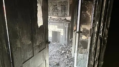 Essex Fire Service Fire gutted rooms at the home in Colchester