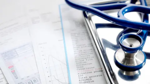 SPL A stethoscope and paperwork