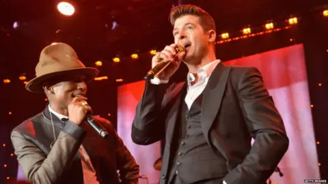 Getty Images Pharrell Williams and Robin Thicke perform at the Grammy Awards - 25 January 2015