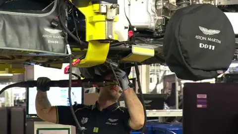 worker in Aston Martin factory