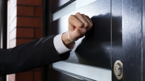 Getty Images Doorstep scam