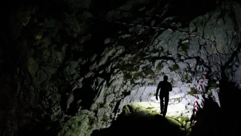 AFP/Getty Rescue workers in a German cave 2014