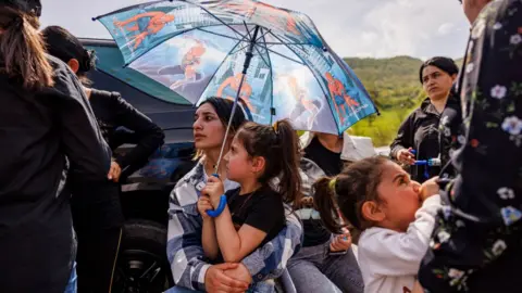 ANTHONY PIZZOFERRATO/Middle East Images/AFP Residents of Tavush protest, and block the Yerevan-Tbilisi interstate road between Kirants and Voskepar in Kirants, Armenia on Sunday, April 21, 2024