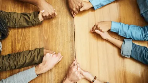 Getty Images Praying hands