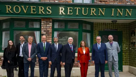 PA Media Dignitaries outside Rovers Return