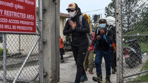 Getty Images Tsang Yin Hung, 45, who scaled Mount Everest in less than 26 hours