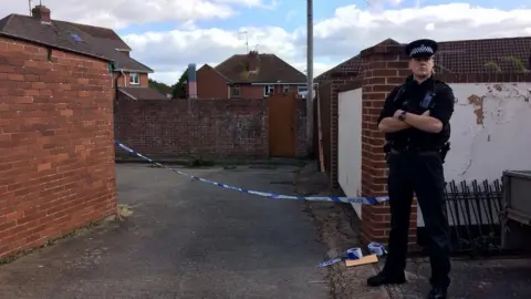 BBC Police officer at Westbrook Close.