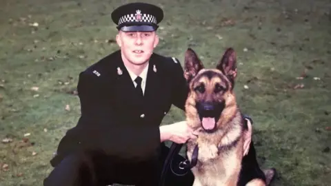 K9 Memorial UK Paul Nicholls with Sabre