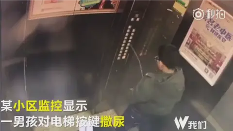 Beijing News A boy peeing in a lift