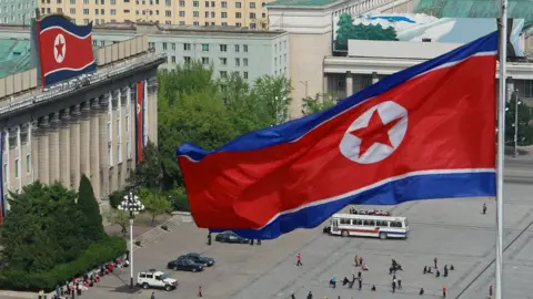 Getty Images North Korean flags fly from buildings in Kim Il Sung Square in Pyongyang