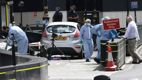 PA Forensics at the scene of the crash near parliament