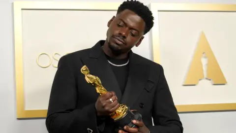 Reuters Daniel Kaluuya with his Oscar