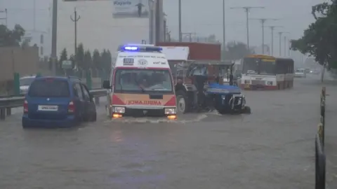 Getty Images A view of waterlogged NH 56 after heavy rains on September 16, 2021 in Lucknow, India. Continuous heavy rain on Thursday threw life out of gear in Lucknow and exposed the tall claims of the municipal corporation.