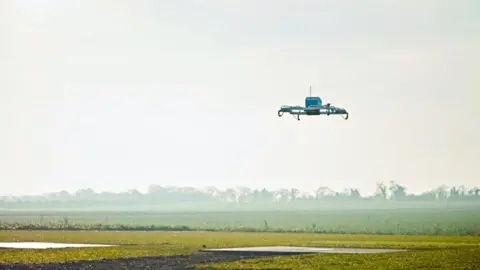 Amazon Amazon drone flying in the sky