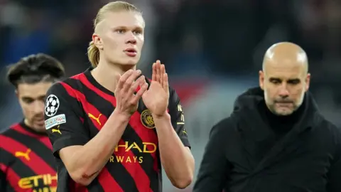 Erling Haaland and Pep Guardiola applaud fans after draw with RB Leipzig
