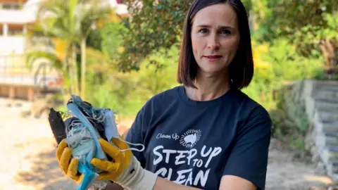 Clean Up Australia Pip Kiernan holding rubbish