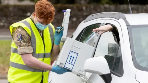 PA Media Soldier at mobile testing unit
