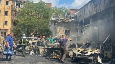 State Emergency Service of Ukraine Emergency workers at the scene of the attack in Vinnytsia