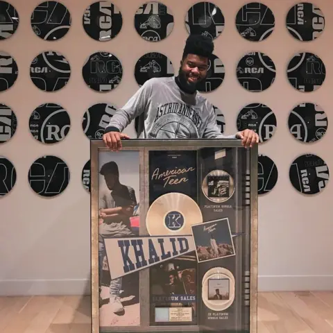 Khalid / Instagram Khalid receives his platinum disc