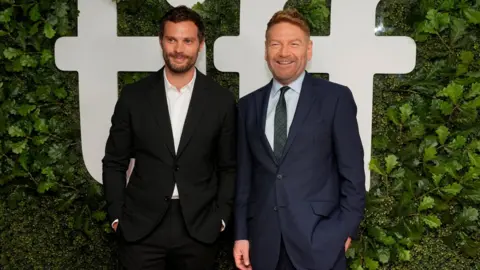 MARK BLINCH/REUTERS Jamie Dornan and Sir Kenneth Branagh