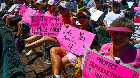 Getty Images Pro-abortion rights activists participate in the "Rally for Our Freedom" to protect abortion rights for Floridians, in Orlando, Florida, on April 13, 2024