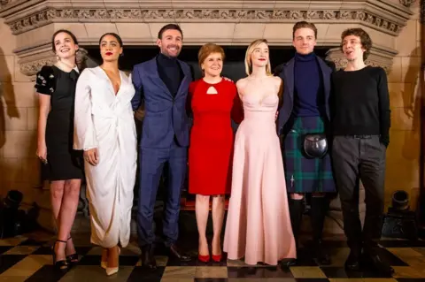 Getty Images Jack Lowden, Nicola Sturgeon and the cast of Mary, Queen of Scots