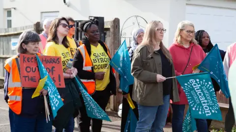File image showing staff at an NEU strike picket line on 17 May