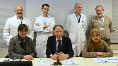 Gasolini Hospital, Genoa Hospital staff and Tafida's mother Shelina Begum (bottom far right)