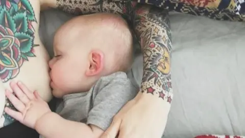 Instagram Charlie breastfeeding her son