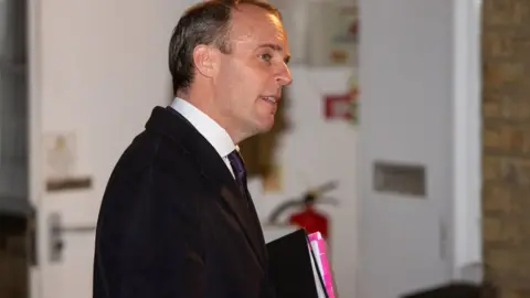 PA Media Dominic Raab