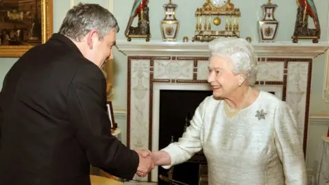 PA Media Gordon Brown and the Queen