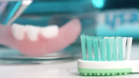 BBC Toothbrush and partial denture