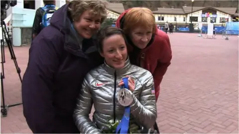 Wheelchair racer Tatyana McFadden with her adopted mother Deborah McFadden and her birth mother Nina Polevikova