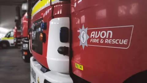 Avon Fire & Rescue Service Photo of an Avon Fire & Rescue logo on a fire truck