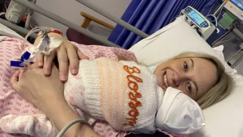 Samantha Catanach Samantha Catanach with her baby daughter