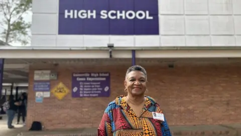 Chelsea Bailey, BBC News LaVon Bracy in front of Gainesville High