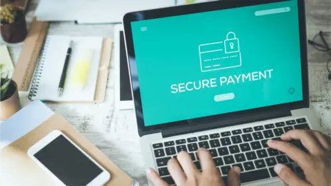 Getty Images A laptop screen showing secure payments