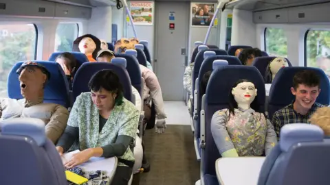 PA Media Passengers on the London-to-Margate train enjoyed the journey with Oscar Murillo's effigies