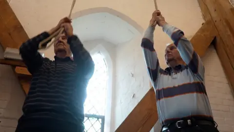 Jamie Niblock/BBC Terry and Tony Stock ringing church bells