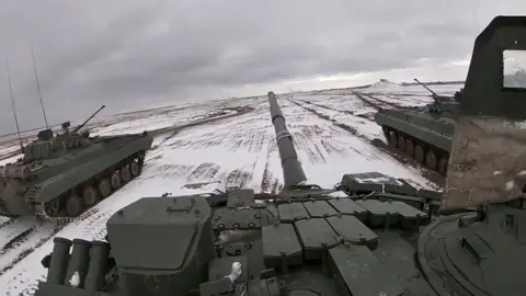 Russian defence ministry Tanks ride during joint exercises of the armed forces of Russia and Belarus as part of an inspection of the Union State"s Response Force, at a firing range in Belarus. File photo