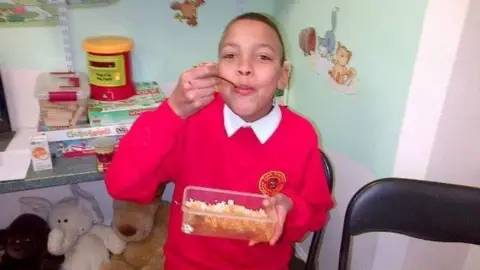 Family handout Kane Mansaray as a child