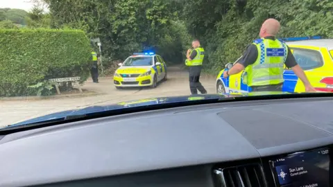 Carrie Gray Police on a road