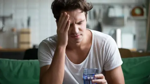 Getty Images man with headache